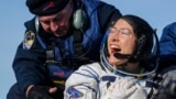 NASA astronaut Christina Koch reacts shortly after landing in a remote area outside the town of Dzhezkazgan (Zhezkazgan), Kazakhstan, on February 6, 2020.