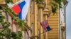 RUSSIA -- A Russian flag flies next to the U.S. embassy building in Moscow, July 31, 2017