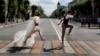  Newlyweds pose for wedding photographers on a zebra crossing during the July 2018 soccer World Cup in Samara, Russia.