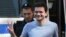 RUSSIA -- Russian opposition figure and excluded election candidate Ilya Yashin is escorted to a court hearing in Moscow, August 29, 2019