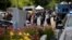 shooting Maryland - Annapolis, U.S./Law enforcement officials survey the scene after a gunman fired through a glass door at the Capital Gazette newspaper and sprayed the newsroom with gunfire, killing at least five people and injuring several others, June
