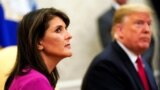 U.S. -- U.S. President Donald Trump meets with U.N. Ambassador Nikki Haley in the Oval Office of the White House after it was announced the president had accepted the Haley's resignation in Washington, U.S., October 9, 2018