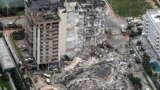 An aerial view showing a partially collapsed building in Surfside near Miami Beach, Florida, U.S., June 24, 2021