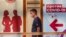 RUSSIA -- A man wearing a face mask walks past the vaccination point at the State Department Store GUM in Moscow, June 15, 2021