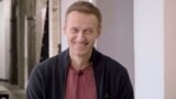 GERMANY -- Russian opposition politician Aleksei Navalny smiles during an interview with prominent Russian YouTube blogger Yury Dud, in Berlin, in this still image taken from a handout video released October 6, 2020