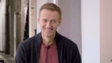 GERMANY -- Russian opposition politician Aleksei Navalny smiles during an interview with prominent Russian YouTube blogger Yury Dud, in Berlin, in this still image taken from a handout video released October 6, 2020
