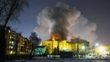 RUSSIA -- Smoke rises above a multi-story shopping center in the Siberian city of Kemerovo, March 25, 2018