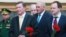 Руководитель администрации президента РФ Сергей Иванов, министр культуры РФ Владимир Мединский (слева направо на первом плане), вице-губернатор Санкт-Петербурга Александр Говорунов (в центре на втором плане) на церемонии открытия памятной доски в честь генерала-лейтенанта русской армии Густава Маннергейма на фасаде здания Военной академии материально-технического обеспечения, 17 июня 2016