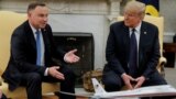 Washington, U.S. - U.S. President Donald Trump listens to Poland's President Andrzej Duda during a meeting in the Oval Office at the White House 