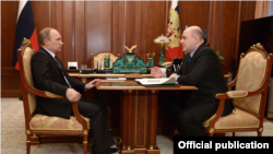 Russian President Vladimir Putin meets with Mikhail Mishustin on January 15, 2019.