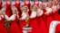 RUSSIA -- Russia's Igor Moiseyev Ballet ensemble perform behind the FIFA World Cup trophy ahead of the 2018 FIFA World Cup football tournament final draw at the State Kremlin Palace in Moscow, December 1, 2017