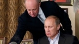 Евгений Пригожин с Владимиром Путиным в 2011 году. Фото: AP