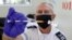 FILE PHOTO: A health worker prepares a vaccination against the coronavirus disease (COVID-19) at a mobile vaccination centre, as Israel continues to fight against the spread of the Delta variant, in Tel Aviv, Israel July 6, 2021.