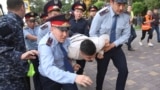 KAZAKHSTAN -- Law enforcement officers detain a man during an opposition rally held by critics of Kazakh President Kassym-Jomart Tokayev, who protest over his election in Almaty, Kazakhstan June 12, 2019.