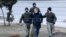 BELARUS -- Law enforcement officers detain a man in Minsk, March 25, 2021