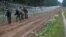 Poland -- Polish soldiers build a fence on the border between Poland and Belarus near the village of Nomiki, Poland August 26, 2021