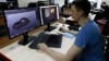 A programmer for Game Stream, a branch of video game company Wargaming, at work in Minsk in 2016.