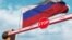GENERIC – Barrier gate being closed with flag of Russia as a background. Russian restricted entry or certain ban. 3D rendering