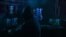 GENERIC – Internet crime concept. Hacker working on a code on dark digital background with digital interface around.