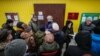 RUSSIA -- Relatives of the protesters, who were detained during opposition protests in Moscow, gather near the Center for the Temporary Detention of Foreign Citizens in the village of Sakharovo, February 4, 2021