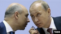 Министр экономики России Антон Силуанов и президент России Владимир Путин