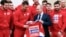 RUSSIA -- Russian President Vladimir Putin (C) poses for a picture with ice hockey players during a meeting with Russian athletes and team members, who will take part in the upcoming 2018 Pyeongchang Winter Olympic Games, at the Novo-Ogaryovo state reside