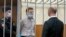 RUSSIA -- Former Khabarovsk regional Governor Sergei Furgal (center) attends a court hearing in Moscow, March 3, 2021