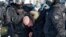 RUSSIA -- Police detain a man during a protest against the jailing of opposition leader Alexei Navalny in Khabarovsk, 6,100 kilometers (3,800 miles) east of Moscow, Russia, Saturday, Jan. 23, 2021. Authorities in Russia have taken measures to curb protest