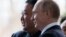RUSSIA -- Russian President Vladimir Putin welcomes North Korean leader Kim Jong Un prior to their talks at the Far Eastern Federal University campus on Russky island in Vladivostok, April 25, 2019