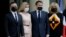 FRANCE -- French President Emmanuel Macron, second right, and his wife Brigitte Macron, right, pose with Ukrainian President Volodymyr Zelenskiy, left, and Olena Zelenska before a working lunch at the Elysee palace in Paris, April 16, 2021