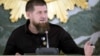 Кадыров на совещании оперативного штаба 26 мая (прячет под стол руку с катетером)
