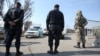 В Алматы на полный карантин закрыли 4 многоэтажных дома, на въезде во двор выставлены посты