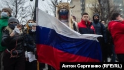 Участник акции протеста 23 января в Москве