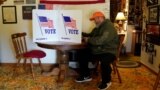 Mountain, Oklahoma, U.S. - ames "Pudge" Brown fills out his ballot in Linda Been's dining room on Super Tuesday
