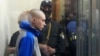 Вадим Шишимарин в Соломенском суде Киева, 13 мая 2022 года. Фото: AP