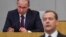 RUSSIA - Russia's acting Prime Minister Dmitry Medvedev and President Vladimir Putin attend a session of the State Duma in Moscow on May 8, 2018.