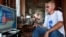 RUSSIA -- An elderly man watches Russian President Vladimir Putin's televised address on pension reform, in Ivanovo, August 29, 2018