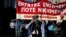 A man shouts slogans during a demonstration marking a 24-hour general strike against austerity in Athens