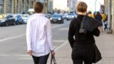 Saint-Petersburg, Russia. Two women on the street from the back 