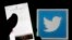 France - A man reads tweets on his phone in front of a displayed Twitter logo in Bordeaux, southwestern France, March 10, 2016.