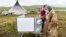 RUSSIA -- Nenets vote -- YAMALO-NENETS AUTONOMOUS AREA, RUSSIA - JUNE 11, 2020: A woman votes in the 2020 Russian constitutional referendum in Priuralsky District of the Yamalo-Nenets Autonomous Area as early voting starts in remote Russian regions. The n