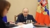 Putin, meeting on economic issues