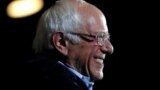 U.S. -- U.S. Democratic presidential candidate Senator Bernie Sanders smiles as he speaks to supporters about being declared the winner of the Nevada Democratic Caucus during a campaign rally in San Antonio, Texas, February 22, 2020