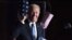 In this file photo taken on November 4, 2020 Democratic presidential nominee Joe Biden gestures as he arrives onstage to address supporters during election night at the Chase Center in Wilmington, Delaware