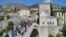 Bosnia and Herzegovina -- Tourists at Old Bridge in Mostar, April 12, 2017