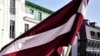 LATVIA – The flag of Ukraine, which opposes Russian aggression, was solemnly hoisted on the building of the Riga City Council. Riga, February 14, 2022