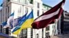 LATVIA – The flag of Ukraine, which opposes Russian aggression, was solemnly hoisted on the building of the Riga City Council. Riga, February 14, 2022