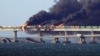 UKRAINE – Fire on the Kerch Bridge after an explosion on it. Ukraine, occupied Crimea, October 8, 2022 