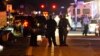 USA – Florida Shooting Aftermath Police vehicles block the road to Marjory Stoneman Douglas High School