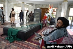 Taliban fighters congregate near the tomb of the late Afghan mujahideen leader Ahmad Shah Masud, the brother of Ahmad Wali Masud, in Panjshir Province on September 15, 2021.